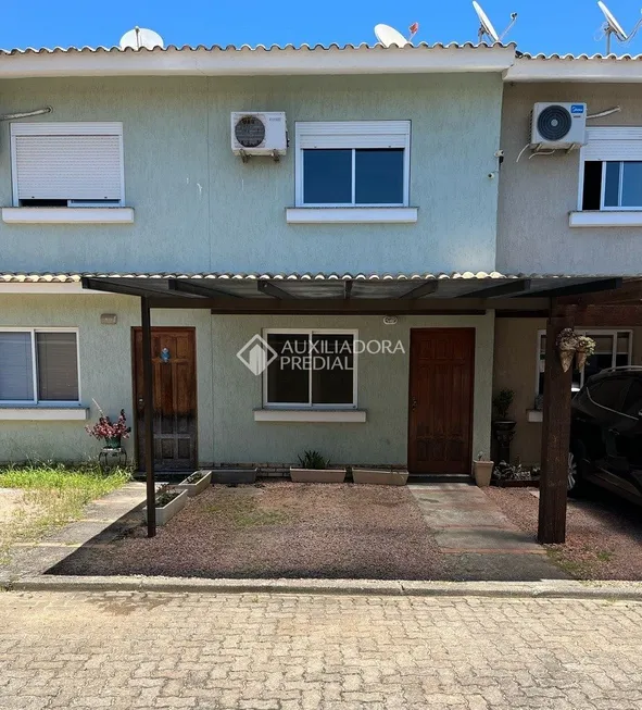 Foto 1 de Casa de Condomínio com 2 Quartos à venda, 97m² em Hípica, Porto Alegre