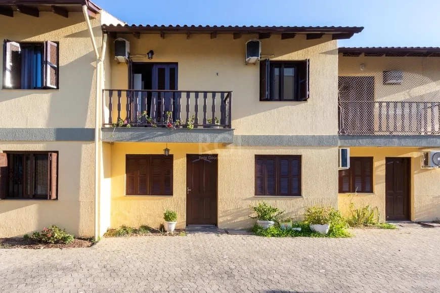 Foto 1 de Casa de Condomínio com 3 Quartos à venda, 106m² em Cavalhada, Porto Alegre