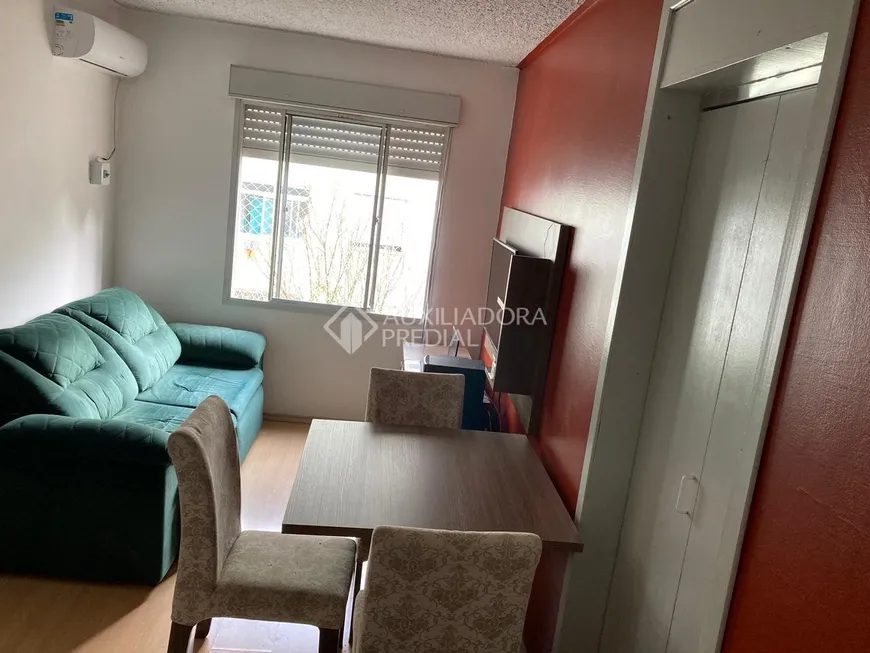 Foto 1 de Apartamento com 2 Quartos à venda, 54m² em Vila Nova, Porto Alegre