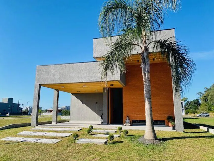 Foto 1 de Casa de Condomínio com 3 Quartos à venda, 360m² em Praia do Rosa, Garopaba