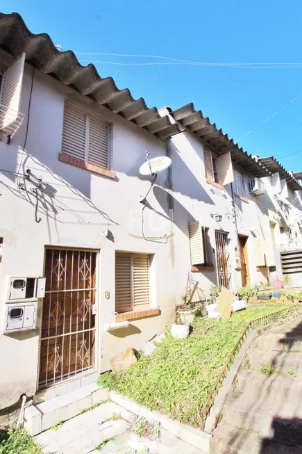 Foto 1 de Sobrado com 2 Quartos à venda, 69m² em Nonoai, Porto Alegre