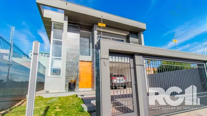 Foto 1 de Casa com 4 Quartos à venda, 239m² em Marechal Rondon, Canoas