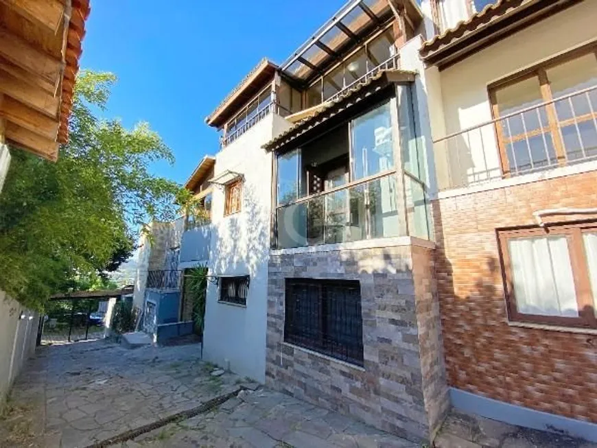 Foto 1 de Casa de Condomínio com 3 Quartos à venda, 177m² em Aberta dos Morros, Porto Alegre