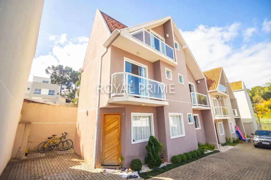 Foto 1 de Sobrado com 3 Quartos à venda, 126m² em Santo Inácio, Curitiba