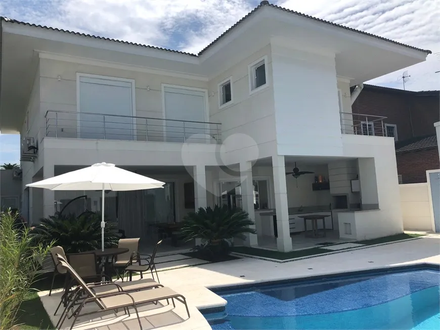 Foto 1 de Sobrado com 5 Quartos à venda, 460m² em Jardim Acapulco , Guarujá