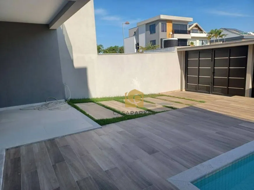 Foto 1 de Casa de Condomínio com 4 Quartos à venda, 400m² em Recreio Dos Bandeirantes, Rio de Janeiro