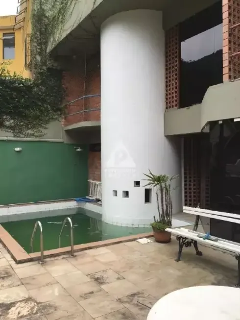 Foto 1 de Casa com 4 Quartos à venda, 450m² em Cosme Velho, Rio de Janeiro