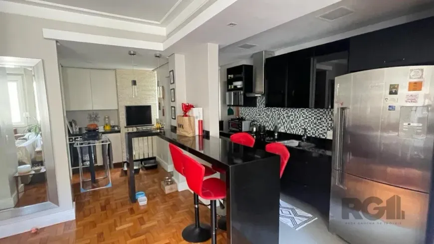 Foto 1 de Apartamento com 1 Quarto à venda, 77m² em Santo Antônio, Porto Alegre