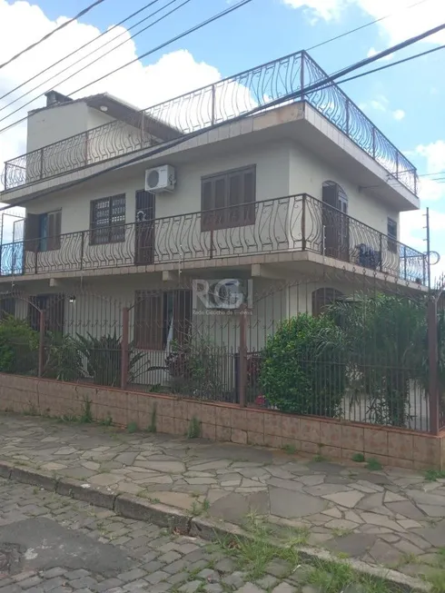 Foto 1 de Casa com 3 Quartos à venda, 199m² em Vila Nova, Porto Alegre