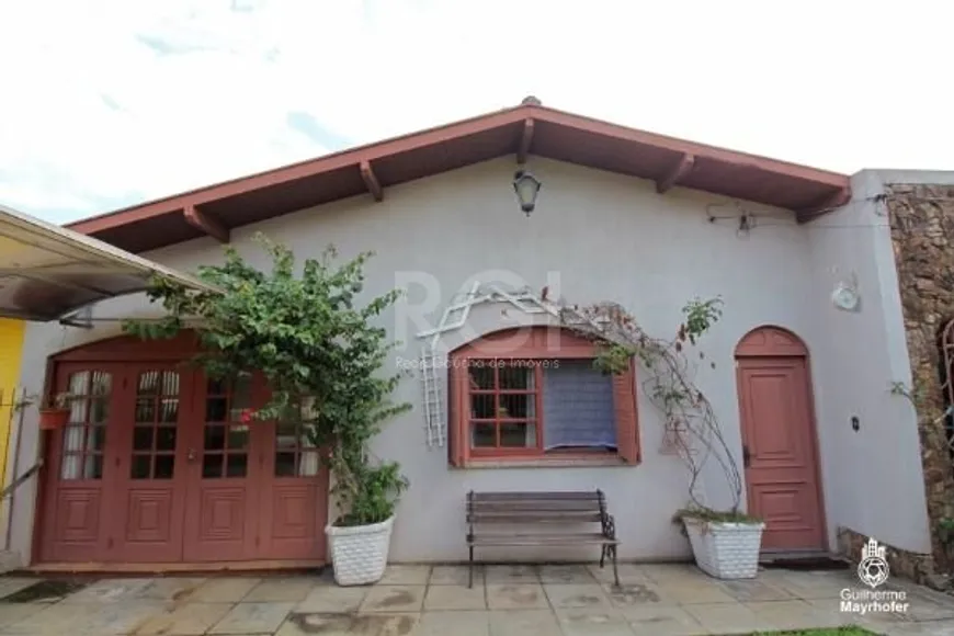 Foto 1 de Casa de Condomínio com 4 Quartos à venda, 150m² em Cristal, Porto Alegre