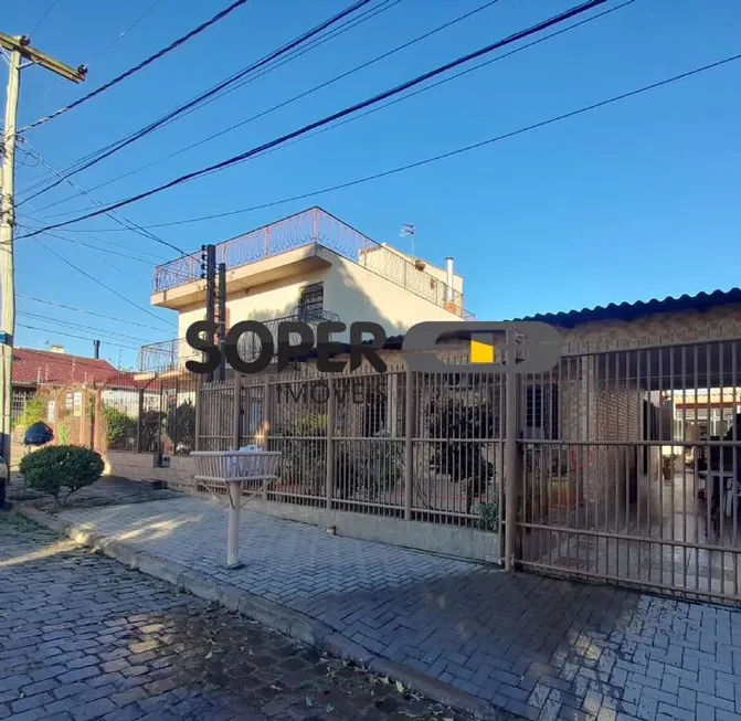 Foto 1 de Casa com 3 Quartos à venda, 200m² em Vila Nova, Porto Alegre