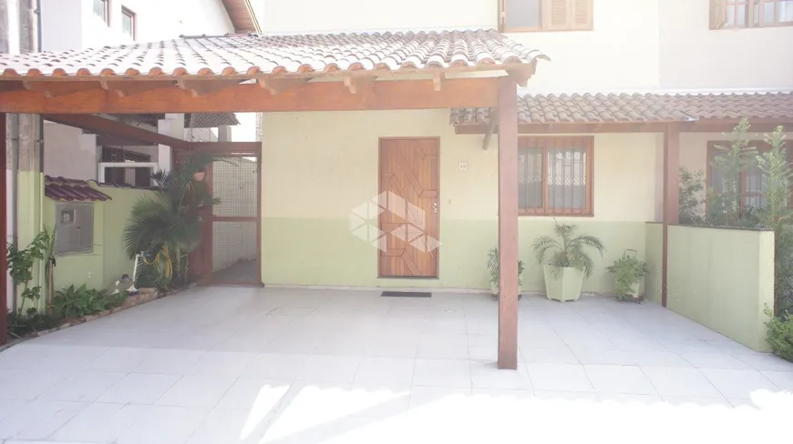 Foto 1 de Casa de Condomínio com 3 Quartos à venda, 136m² em Harmonia, Canoas