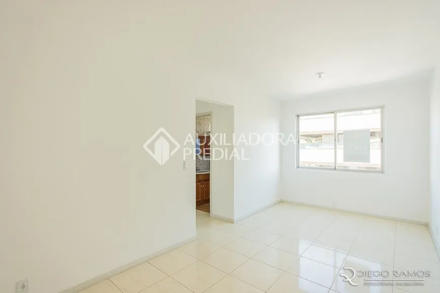 Foto 1 de Apartamento com 2 Quartos à venda, 56m² em Menino Deus, Porto Alegre