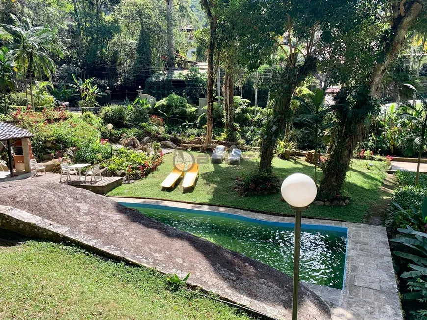 Foto 1 de Casa com 4 Quartos à venda, 300m² em Cascata dos Amores, Teresópolis