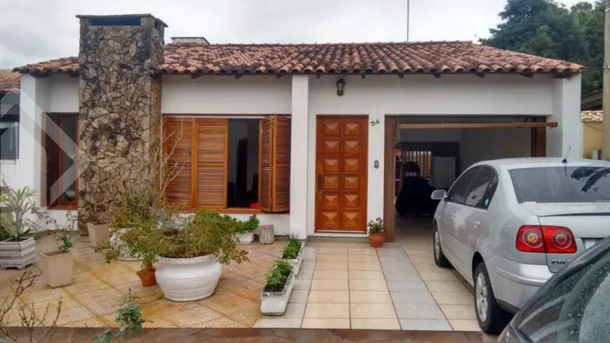 Foto 1 de Casa de Condomínio com 3 Quartos à venda, 110m² em Hípica, Porto Alegre