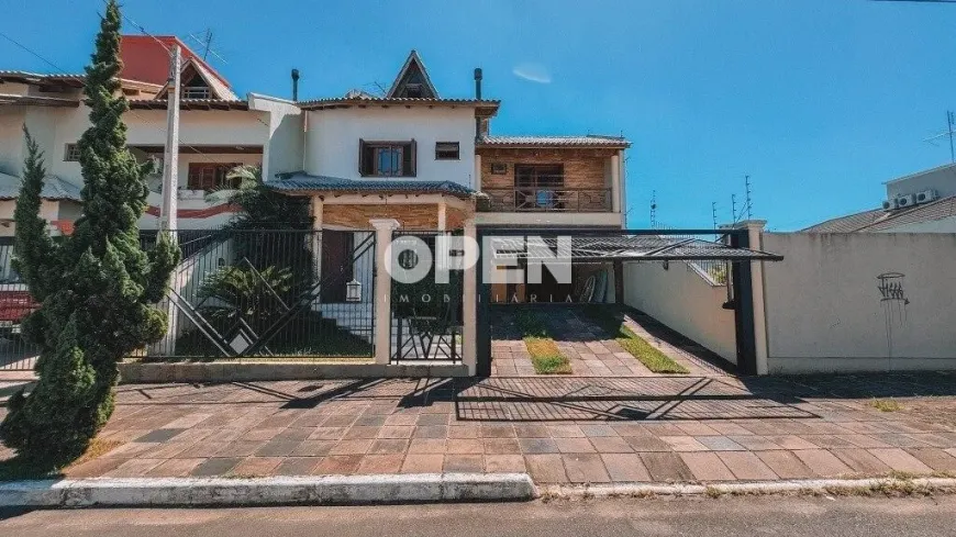 Foto 1 de Sobrado com 5 Quartos para alugar, 320m² em Marechal Rondon, Canoas