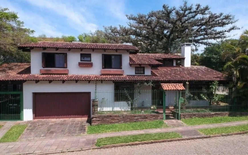 Foto 1 de Casa com 5 Quartos para alugar, 357m² em Ipanema, Porto Alegre