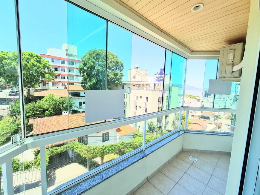 Foto 1 de Apartamento com 3 Quartos à venda, 118m² em Coqueiros, Florianópolis