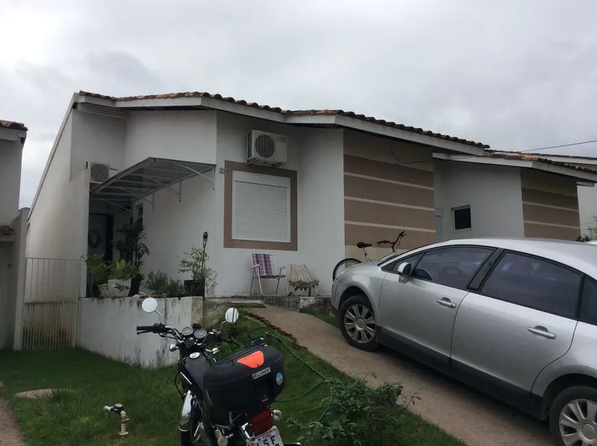 Foto 1 de Casa de Condomínio com 3 Quartos à venda, 70m² em Porto Verde, Alvorada