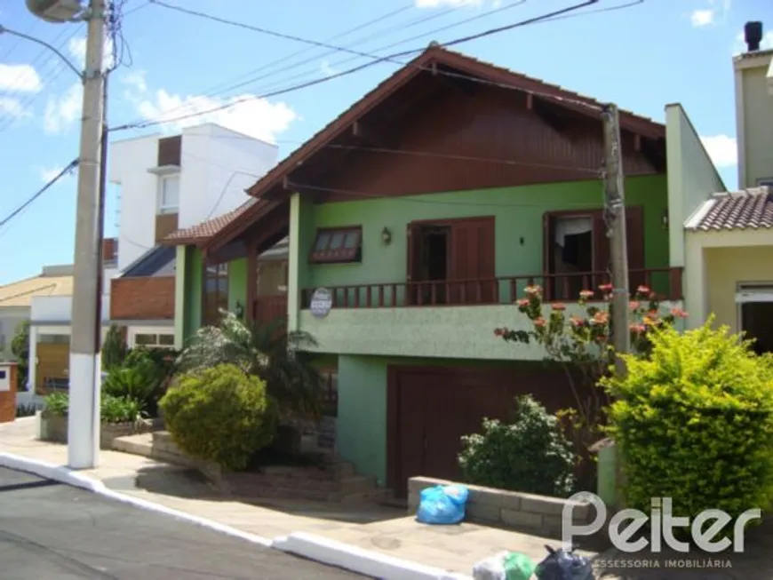 Foto 1 de Casa de Condomínio com 4 Quartos à venda, 300m² em Nonoai, Porto Alegre