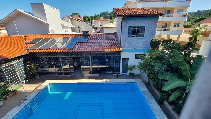 Foto 1 de Casa com 6 Quartos à venda, 400m² em Canasvieiras, Florianópolis