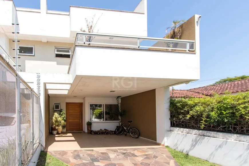 Foto 1 de Casa com 3 Quartos à venda, 211m² em Tristeza, Porto Alegre