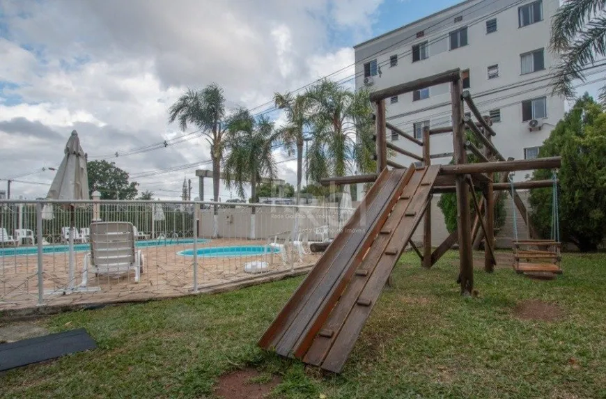 Foto 1 de Casa de Condomínio com 3 Quartos à venda, 117m² em Santa Fé, Porto Alegre