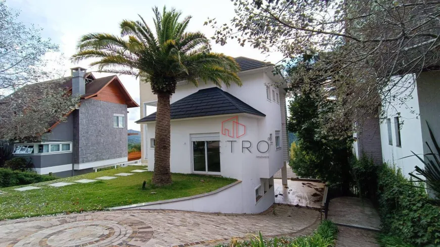 Foto 1 de Casa de Condomínio com 4 Quartos à venda, 500m² em Centro, Gramado