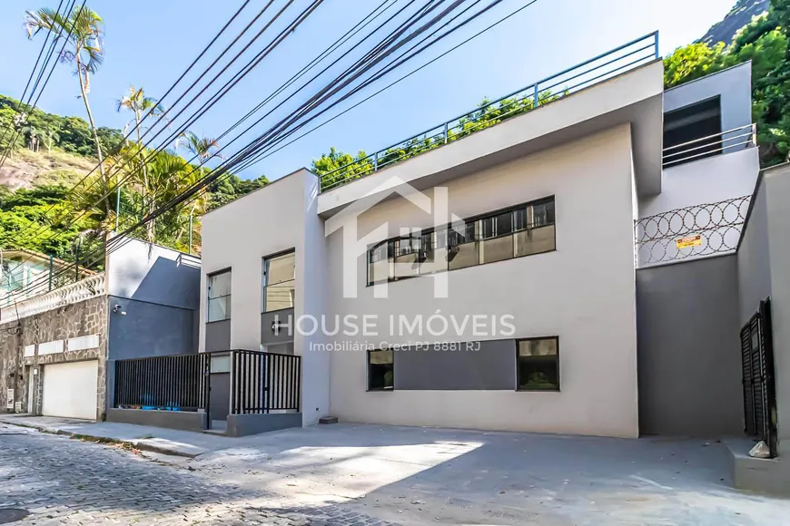 Foto 1 de Casa com 6 Quartos à venda, 677m² em Laranjeiras, Rio de Janeiro