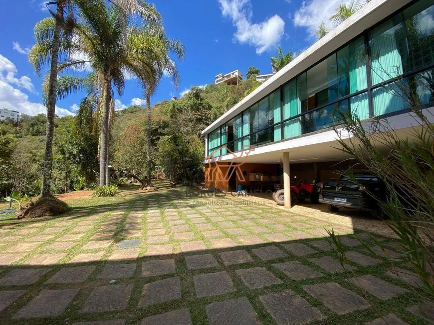 Foto 1 de Casa de Condomínio com 4 Quartos para venda ou aluguel, 690m² em Vila  Alpina, Nova Lima