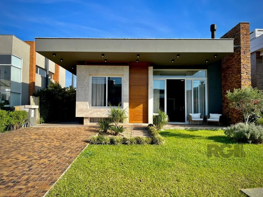 Foto 1 de Casa de Condomínio com 4 Quartos à venda, 250m² em Xangri la, Xangri-lá