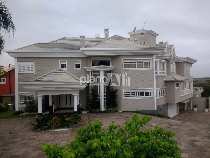 Foto 1 de Casa de Condomínio com 5 Quartos à venda, 1962m² em Paragem dos Verdes Campos, Gravataí