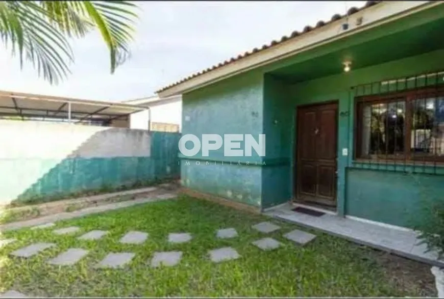 Foto 1 de Casa com 2 Quartos à venda, 78m² em Guajuviras, Canoas