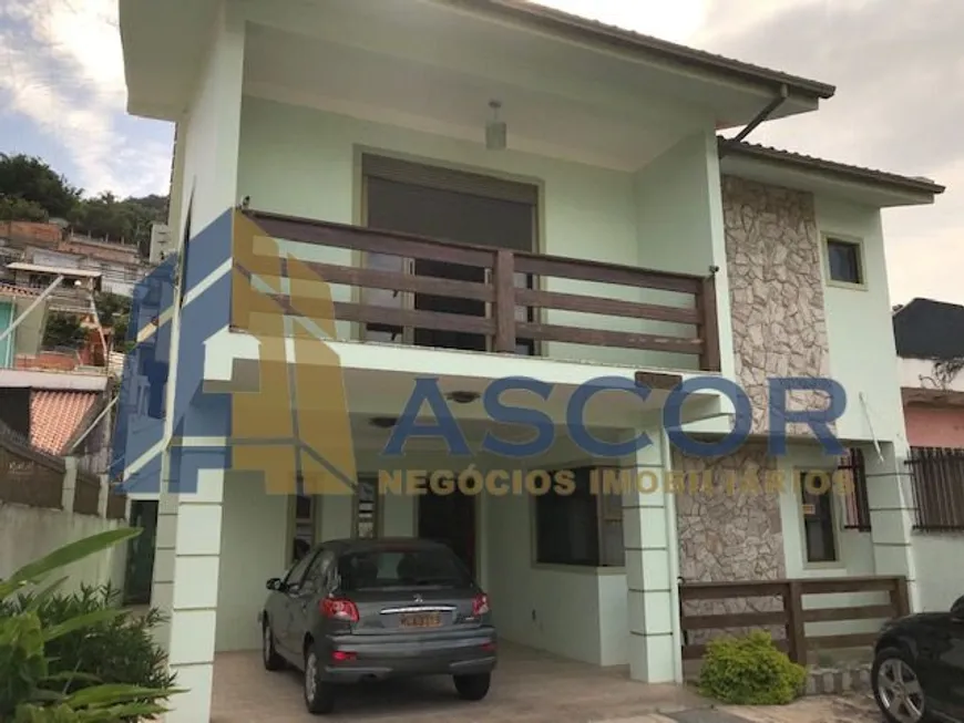 Foto 1 de Casa com 4 Quartos à venda, 212m² em Costeira do Pirajubaé, Florianópolis