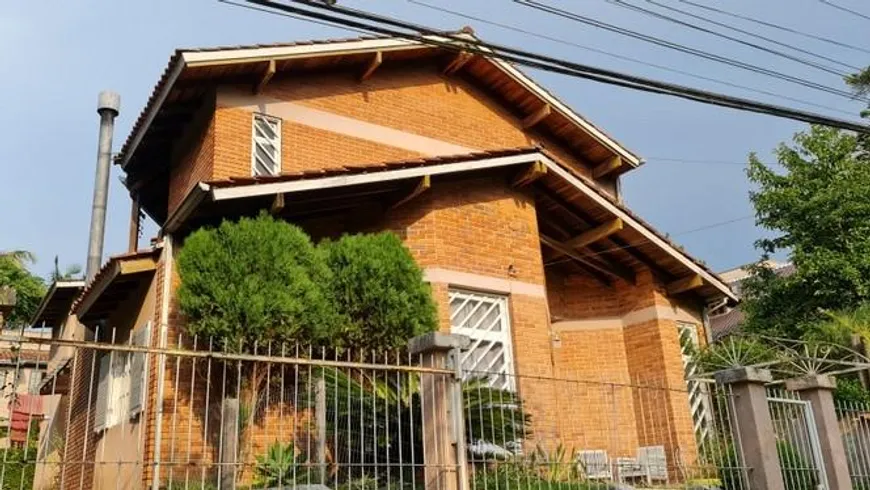 Foto 1 de Casa de Condomínio com 5 Quartos à venda, 360m² em Condominio Cantegril, Viamão