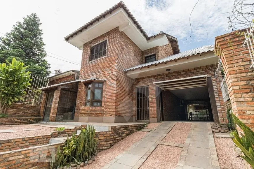 Foto 1 de Casa com 3 Quartos à venda, 300m² em Passo da Areia, Porto Alegre