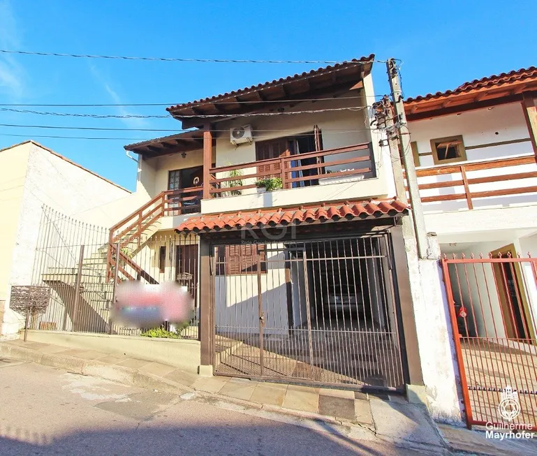 Foto 1 de Casa com 5 Quartos à venda, 244m² em Jardim Itú Sabará, Porto Alegre