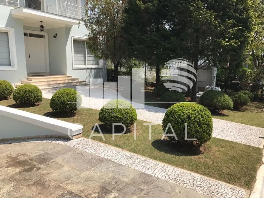 Foto 1 de Casa de Condomínio com 5 Quartos para venda ou aluguel, 700m² em Alphaville, Santana de Parnaíba