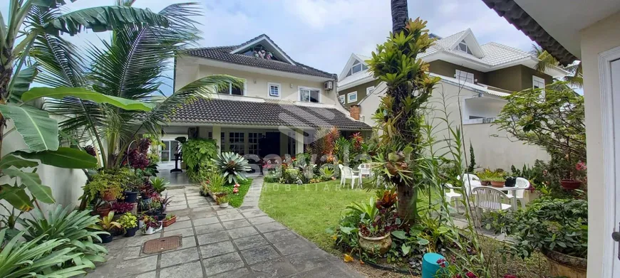 Foto 1 de Casa de Condomínio com 5 Quartos à venda, 400m² em Barra da Tijuca, Rio de Janeiro