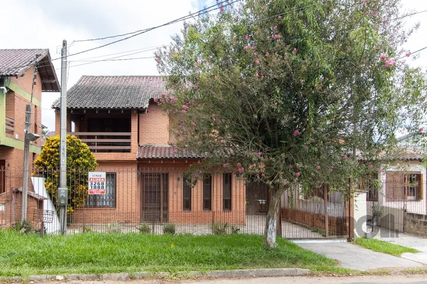 Foto 1 de Casa com 3 Quartos à venda, 206m² em Vila Nova, Porto Alegre