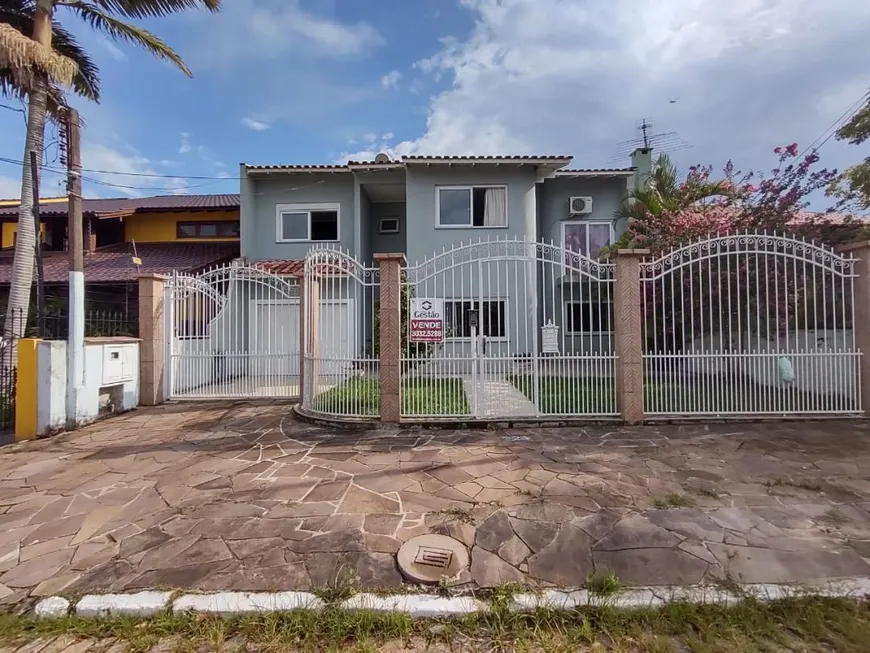 Foto 1 de Casa com 4 Quartos à venda, 257m² em Igara, Canoas