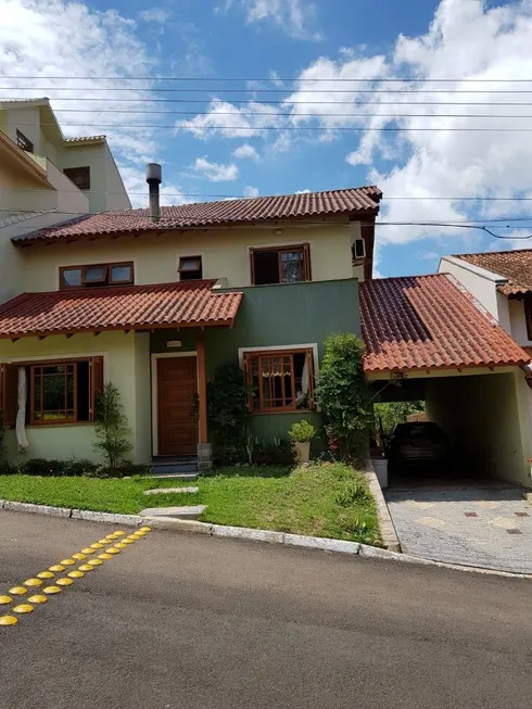 Foto 1 de Casa de Condomínio com 3 Quartos à venda, 188m² em Cavalhada, Porto Alegre