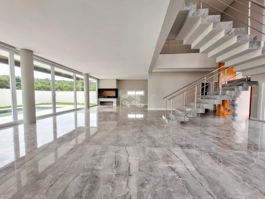 Foto 1 de Casa de Condomínio com 5 Quartos à venda, 488m² em Morada Gaucha, Gravataí