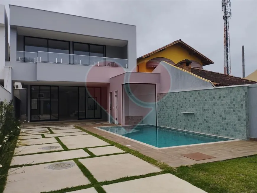 Foto 1 de Casa com 4 Quartos à venda, 350m² em Barra da Tijuca, Rio de Janeiro