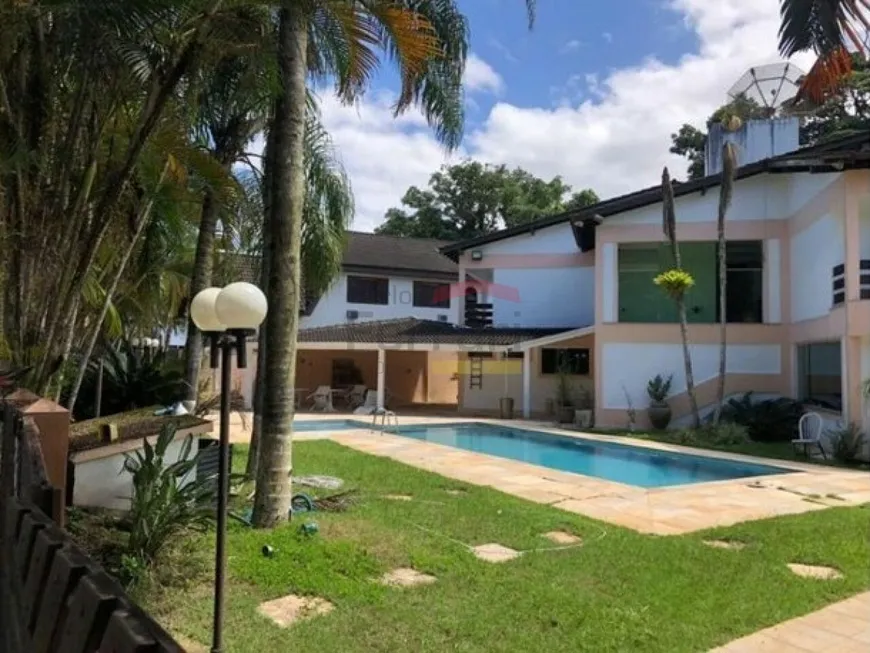 Foto 1 de Casa de Condomínio com 5 Quartos à venda, 467m² em Riviera de São Lourenço, Bertioga