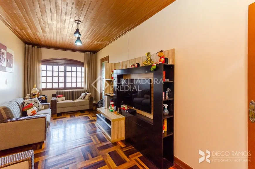 Foto 1 de Casa com 3 Quartos à venda, 238m² em Cavalhada, Porto Alegre