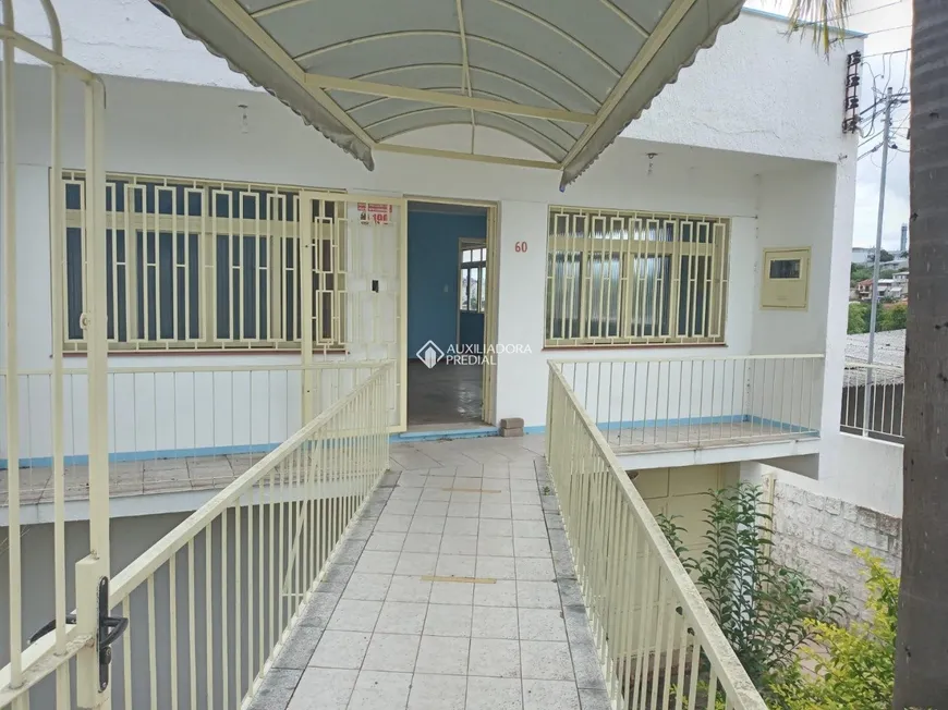Foto 1 de Casa com 5 Quartos à venda, 462m² em Santo Antônio, Porto Alegre