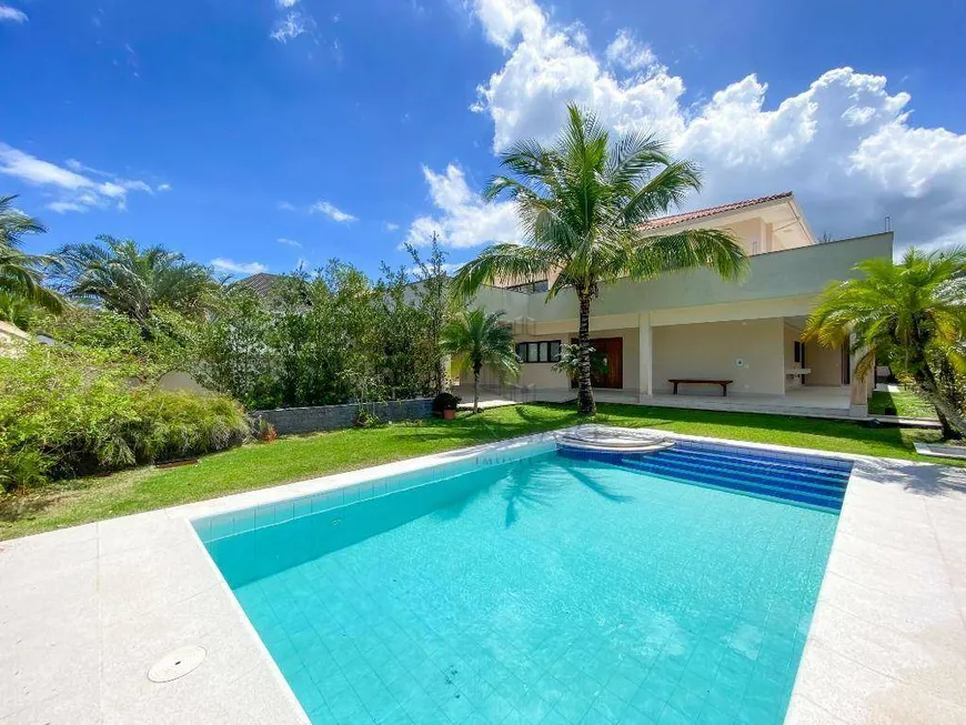 Foto 1 de Casa com 6 Quartos para venda ou aluguel, 1036m² em Barra da Tijuca, Rio de Janeiro