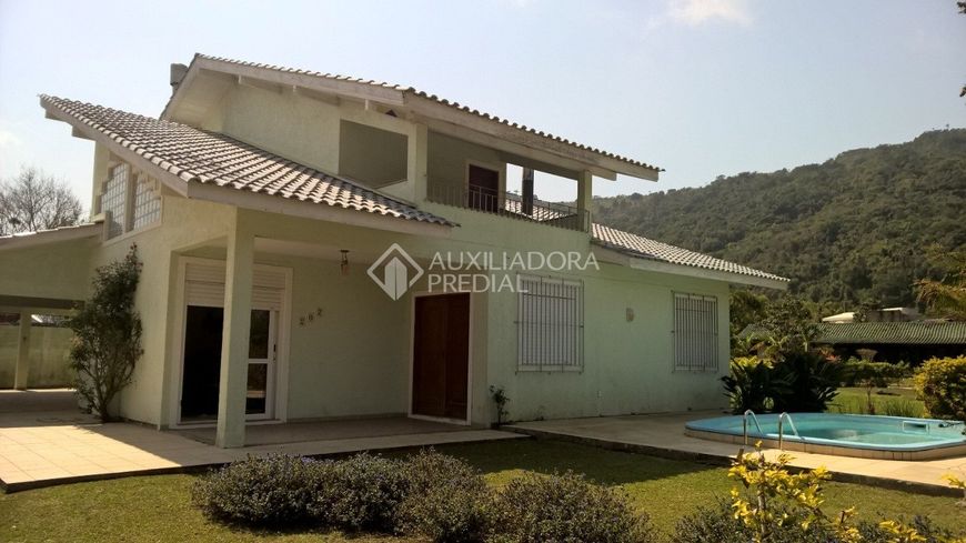 Foto 1 de Casa de Condomínio com 3 Quartos à venda, 220m² em Cachoeira do Bom Jesus, Florianópolis
