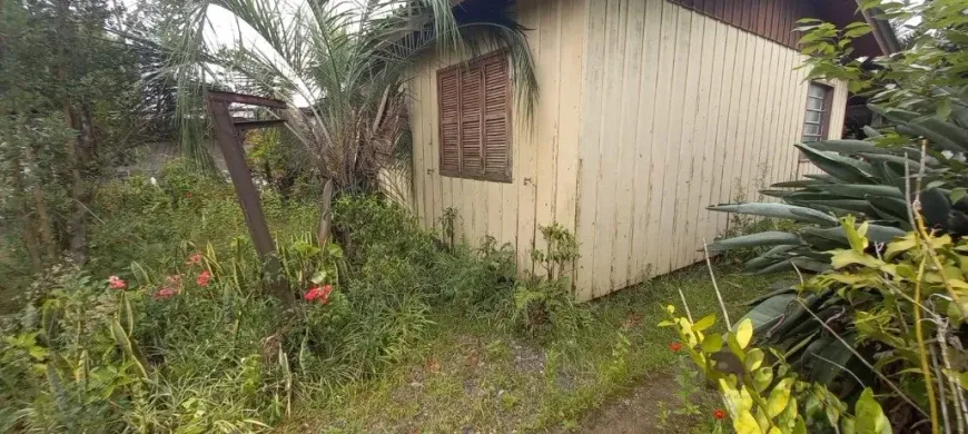 Foto 1 de Casa com 2 Quartos à venda, 71m² em Vila Nova, Porto Alegre